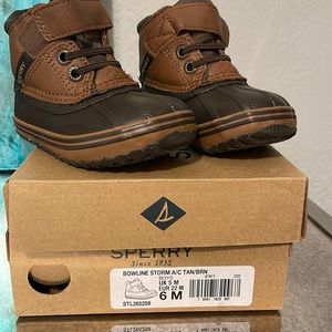 Brand new never worn Boys Sperry boots.